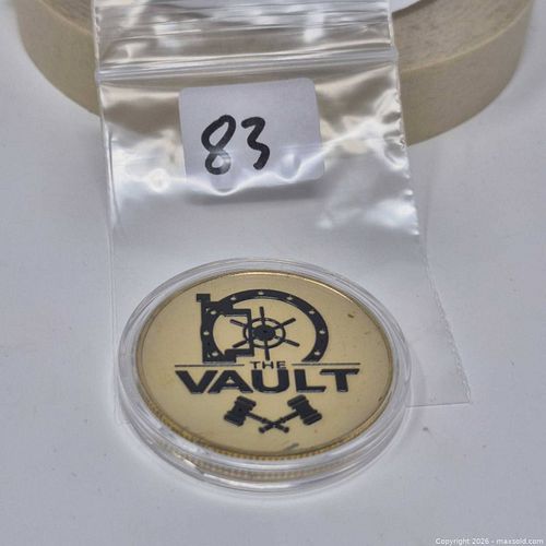 The Vault Gold-Tone Collectible Token in Capsule (1 of 2)
