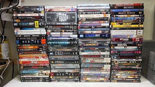 collection of approximately 97 physical media titles, predominantly DVDs and multi-disc TV (1 of 10)