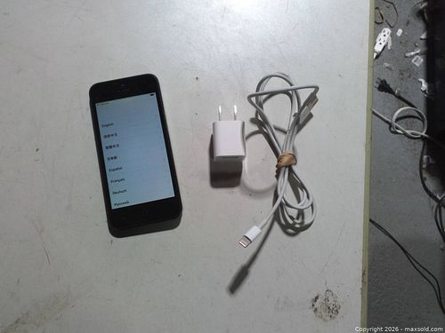 iPhone with charger  (1 of 3)