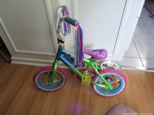 Childs Bike Disney Encanto by Huffy. and Bike Pump. (1 of 9)