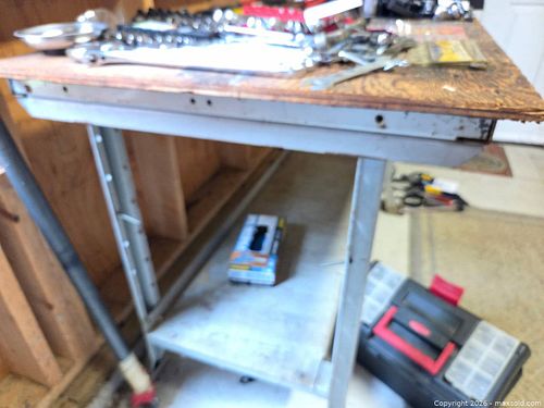 Steel work bench w wooden top (1 of 4)