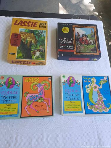 Lot of Jigsaw Puzzle Boxes — Lassie, Artist, Zodiac (1 of 3)
