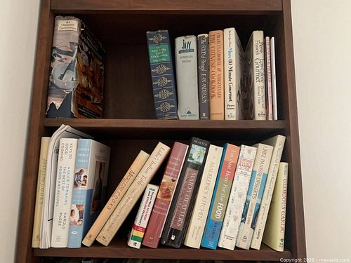 Two shelves of mostly hardback cook books (1 of 7)