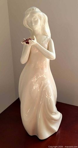 Porcelain statue - girl holding rose (1 of 2)