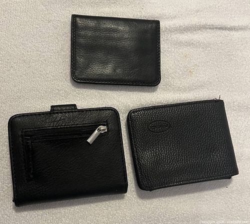 Three black wallets (1 of 2)