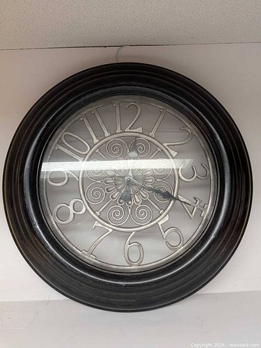 Large decorative wall clock with scrollwork face (1 of 3)