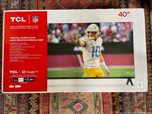 A 40-inch TCL Google T.V. still in box and never used. (1 of 7)