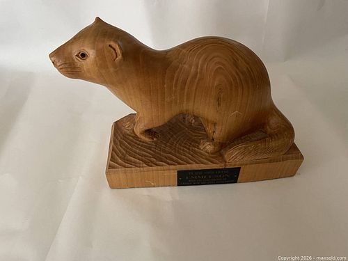 A Beautifully Carved Signed Wooden Mink with Plaque. (1 of 5)