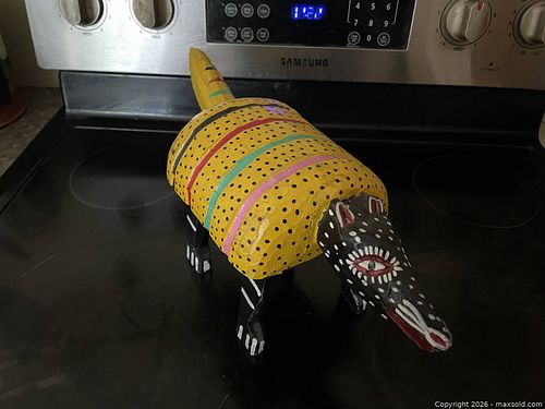 A Handmade/Carved/Painted wooden Folk Art Animal. (1 of 4)