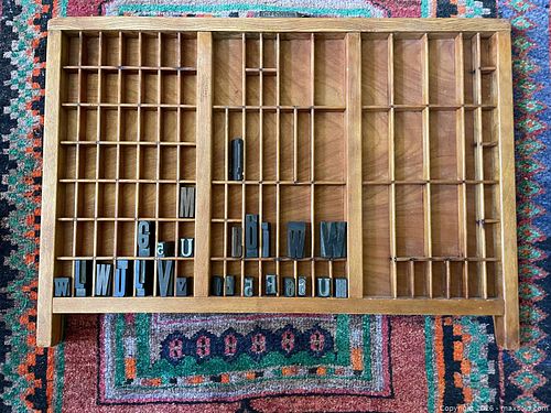An Antique Letterpress type tray with some type blocks. (1 of 4)