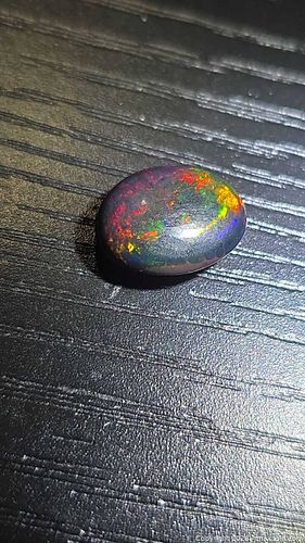 Amazing Top quality huge fire natural black opal  (1 of 10)