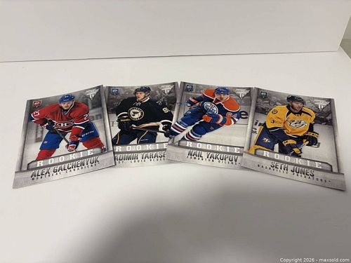 Lot of 4 Titanium 5X7 rookie cards  (1 of 3)