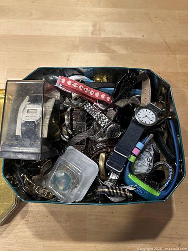 Tin of watches (1 of 3)