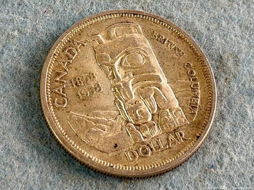 1958 Canada Silver Dollar – British Columbia Centennial Totem Pole (1 of 3)