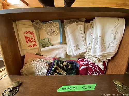 Two drawers of linens and candle holders (1 of 7)