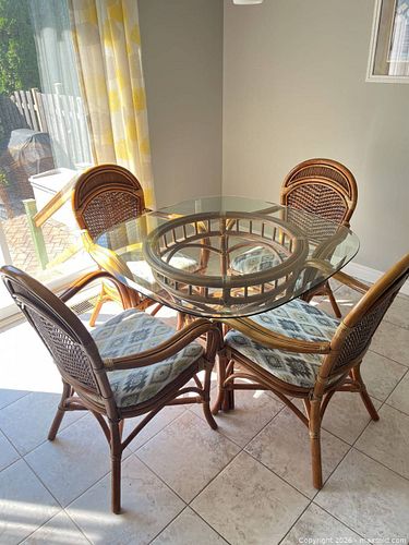 Wicker and glass kitchen table with four chairs (1 of 3)