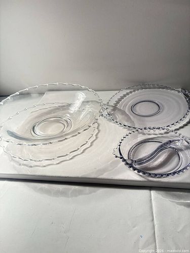 Assorted vintage-style clear pressed glass serving pieces with scalloped and beaded edges  (1 of 9)