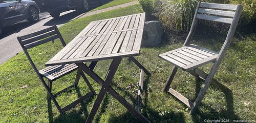 Rustic wooden bistro set includes one folding table and two folding chairs. (1 of 2)