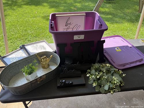 Bin filled with decorative items.  (1 of 7)