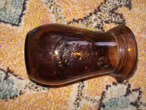 Small Amber Glass Pitcher with Embossed Floral Design (1 of 4)