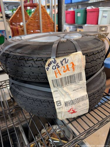 Pair of Trailer Tires Mounted on Steel Rims (1 of 4)