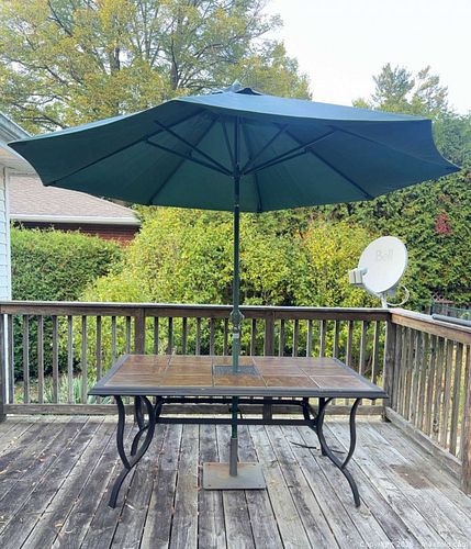 Outdoor Dining Table Featuring Tiled Surface and Patio Umbrella (1 of 14)