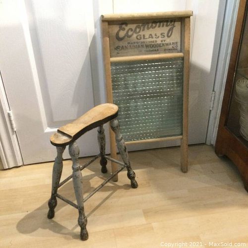 An antique shoemaker's form and scrub board. (1 of 6)