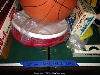 Overview showing basketball, Flinch card game, and Loch Ness monster game boxes