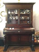 Full front view of secretary desk with bookcase hutch
