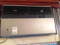 Front view of Friedrich window air conditioner installed in window