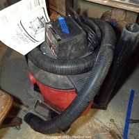 Craftsman shop vac with hose and instruction manual, showing model number and condition