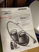 Manual for Bissell Promax carpet cleaner showing model 1660 and deep cleaning machine details.
