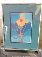 Gallery framed Haida Native art print with stylized mountain and river scene, red sun, two flying birds, signed by artist.