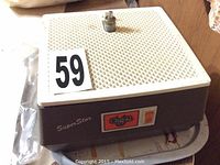 Glastar SuperStar glass grinder unit with diamond bit installed on grid top