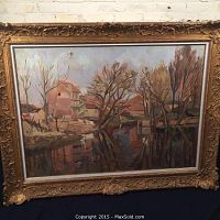 Full view of oil on canvas landscape painting in ornate gilt frame