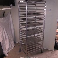 Full view of commercial aluminum bakers rack on caster wheels