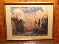 Full view of the framed vintage landscape art showing the textured brush strokes and wooden frame.