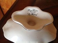 Close-up photo of the Royal Worcester white dish bottom marking 'Our Wedding'