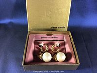 Pair of gold-tone twisted hoop earrings with large faux pearl drops in original Pierre Cardin box with pink satin interior