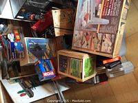 Overall view of boxed tools and front items