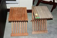 Two teak side tables side by side showing one weathered and stained, the other in better condition