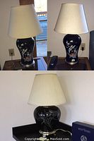 Three lamps shown together, two taller lamps and one shorter lamp, all with floral painted ceramic bases and white pleated shades.