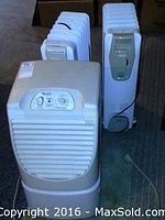 Overview of the three items: two oil-filled space heaters and one dehumidifier, showing their front and side profiles.