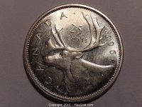 Clear photo of the 1961 Canadian 25 cents silver quarter coin showing the side with the caribou design and inscriptions