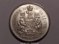 Close-up photo of the reverse side of the 1964 Canadian fifty cent coin showing the detailed crowned coat of arms, date, and denomination.