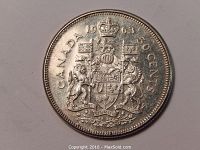 Front side of 1963 Canadian fifty cent silver coin showing detailed Canadian coat of arms, date 1963, and denominations on both sides of the coat of arms.
