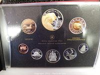 Top view showing all coins of the 2008 Canadian proof set neatly displayed in a protective casing with denomination and designs visible.