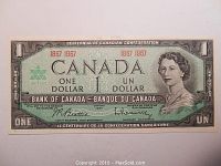 Front view of the 1967 Canadian Centennial one dollar bill showing the portrait of Queen Elizabeth II and details of the text and design.