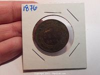 Top side view of 1876 Canadian One Cent coin in cardboard holder