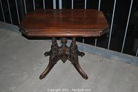 Full view of the solid walnut rectangular parlour table showing top and base